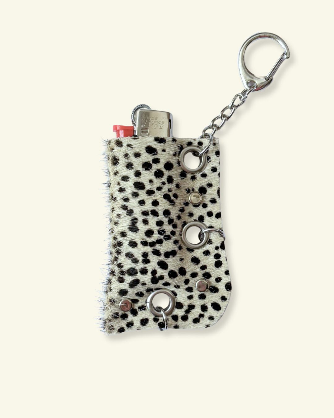 PORTE-BRIQUET [101] - OEILLETS