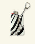 PORTE-BRIQUET [ZEBRA] - OEILLETS