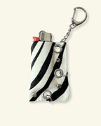 PORTE-BRIQUET [ZEBRA] - OEILLETS