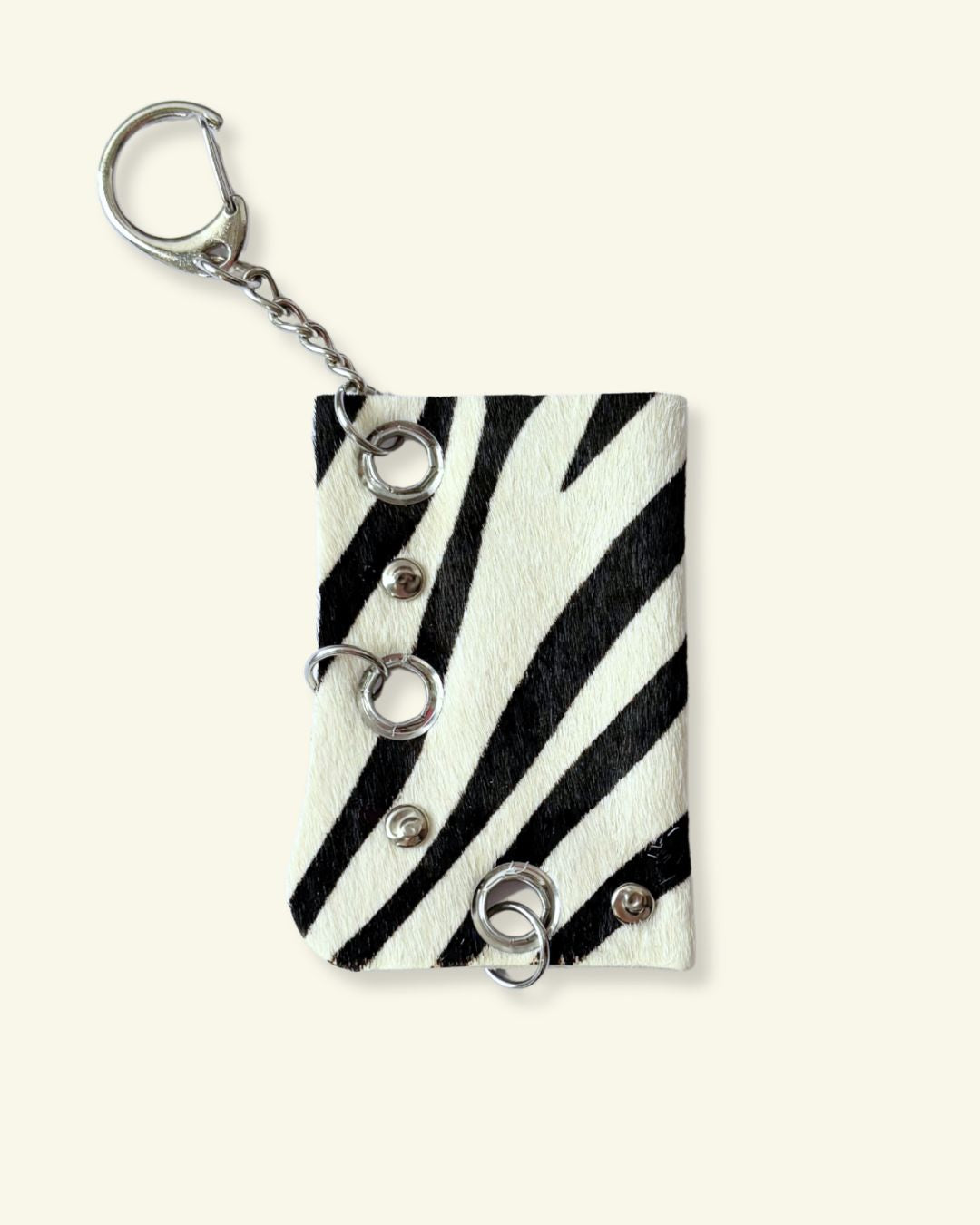 PORTE-BRIQUET [ZEBRA] - OEILLETS