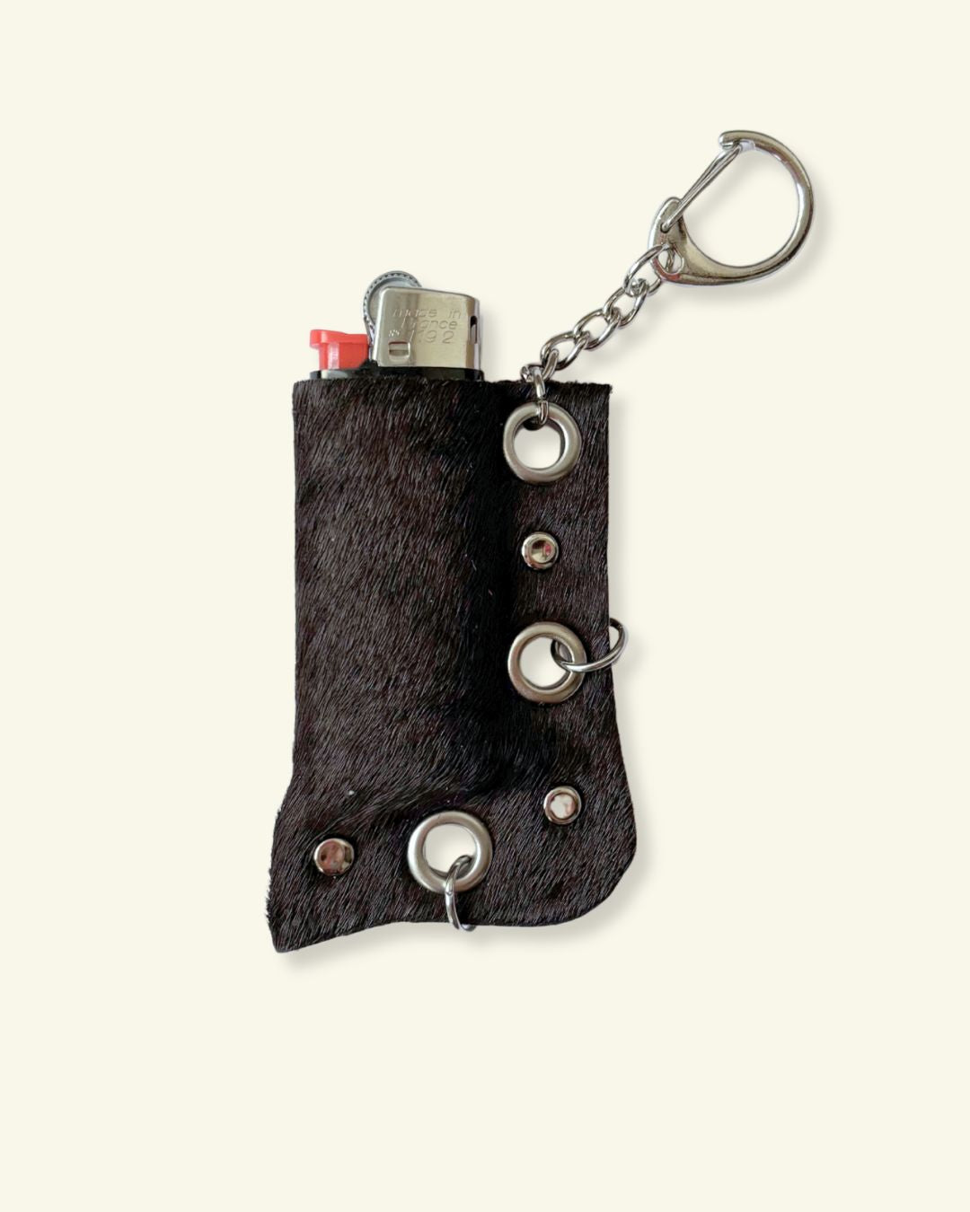 PORTE-BRIQUET [PONEY] - OEILLETS