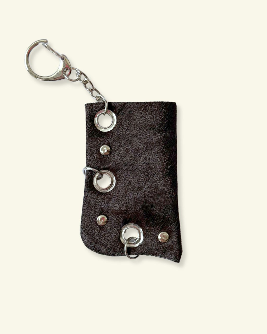 PORTE-BRIQUET [PONEY] - OEILLETS