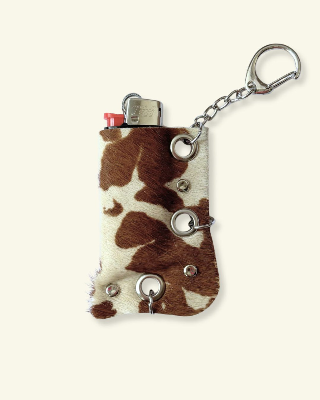 PORTE-BRIQUET [BROWN COW] - OEILLETS